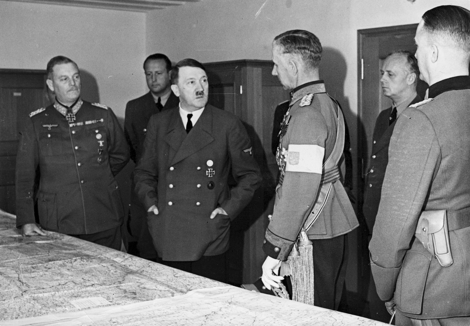 Adolf Hitler at a situation conference with general Wilhelm Keitel, lieutenant general of the Finnish army Harald Öhquist, Joachim von Ribbentrop and general Gerhard Matzky in FHQ Wolfsschanze Adolf Hitler at a situation conference with general Wilhelm Keitel, lieutenant general of the Finnish army Harald Öhquist, Joachim von Ribbentrop and general Gerhard Matzky in FHQ Wolfsschanze